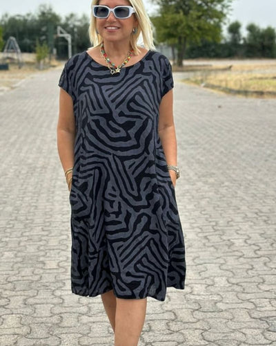 Rosanna – Robe d’été à col rond et imprimé élégant