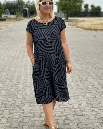 Rosanna – Robe d’été à col rond et imprimé élégant