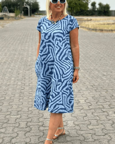 Rosanna – Robe d’été à col rond et imprimé élégant