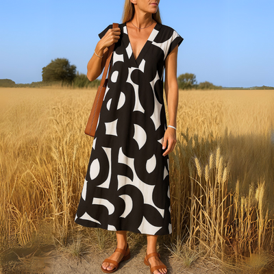 Valérie – Robe à boucles en V