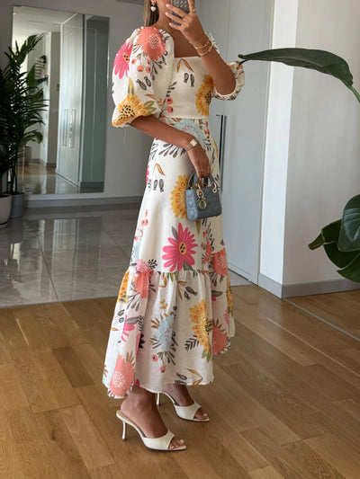 Sandra – Robe midi à encolure carrée, imprimé floral et manches bouffantes